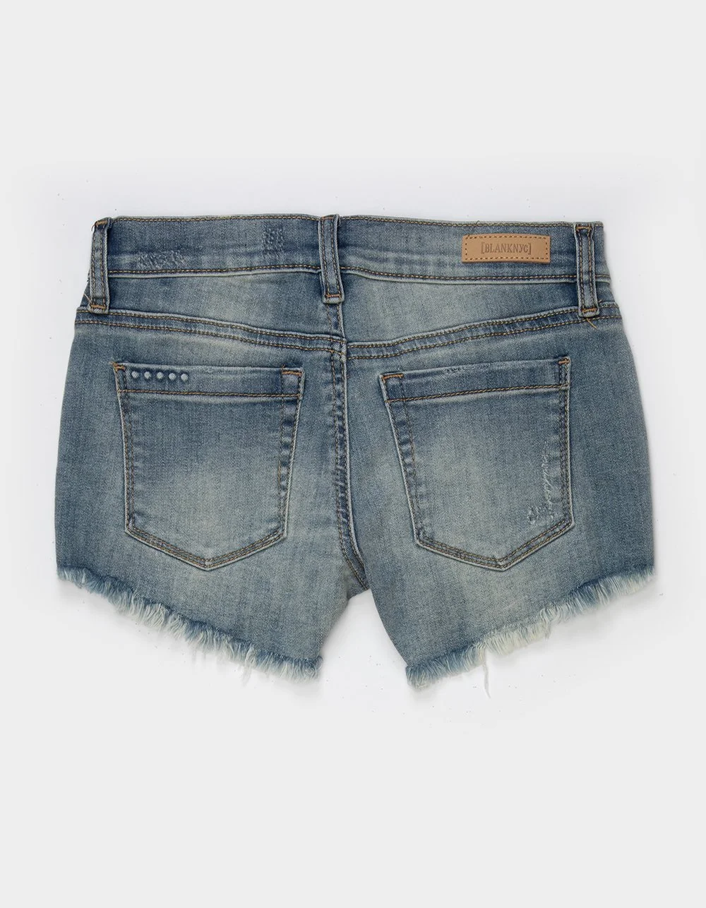Back view of a pair of blue denim shorts with frayed hems and back pockets.