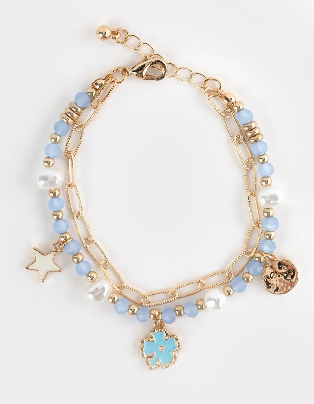 Gold layered bracelet with blue, white, and gold beads and three charms: a star, a flower, and a moon.