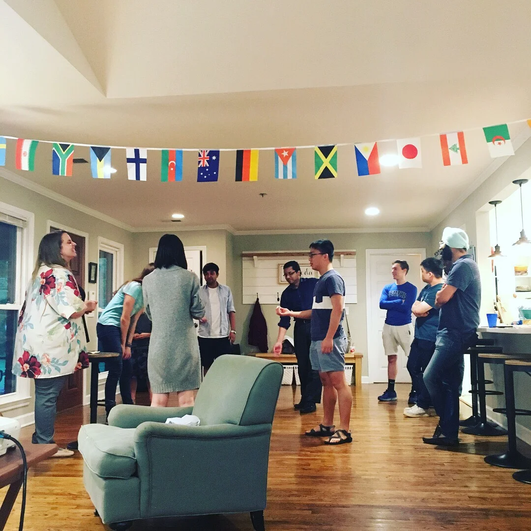 group at mopvie & discussion wiht flags.jpg