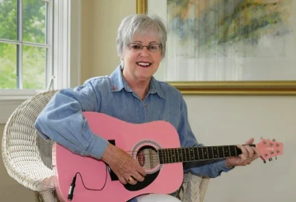 Sally Gomez - pink guitar.jpg
