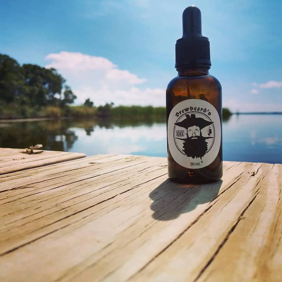 BREWBEARD’S BEARD OIL Brewbeard's Beard Oil Co. was founded on patience and the love of good brew! Growing the perfect beard is often ruined by lack of will power to live and let grow. With our carefully formulated recipe you can now find your inner pirate; be tough and fight through the growing stages without the unbearable dry itchy face that most beards lose their life to! But there's more... Brewbeard's has taken the bearded life one step further. Our oil has been infused with beer, yes you heard it, BEER! With all natural ingredients, the aromas and soft touch of your newly brewed beard will leave people asking how did you grow that?! At this time you can hand them the bottle and tell them I brewed it myself!