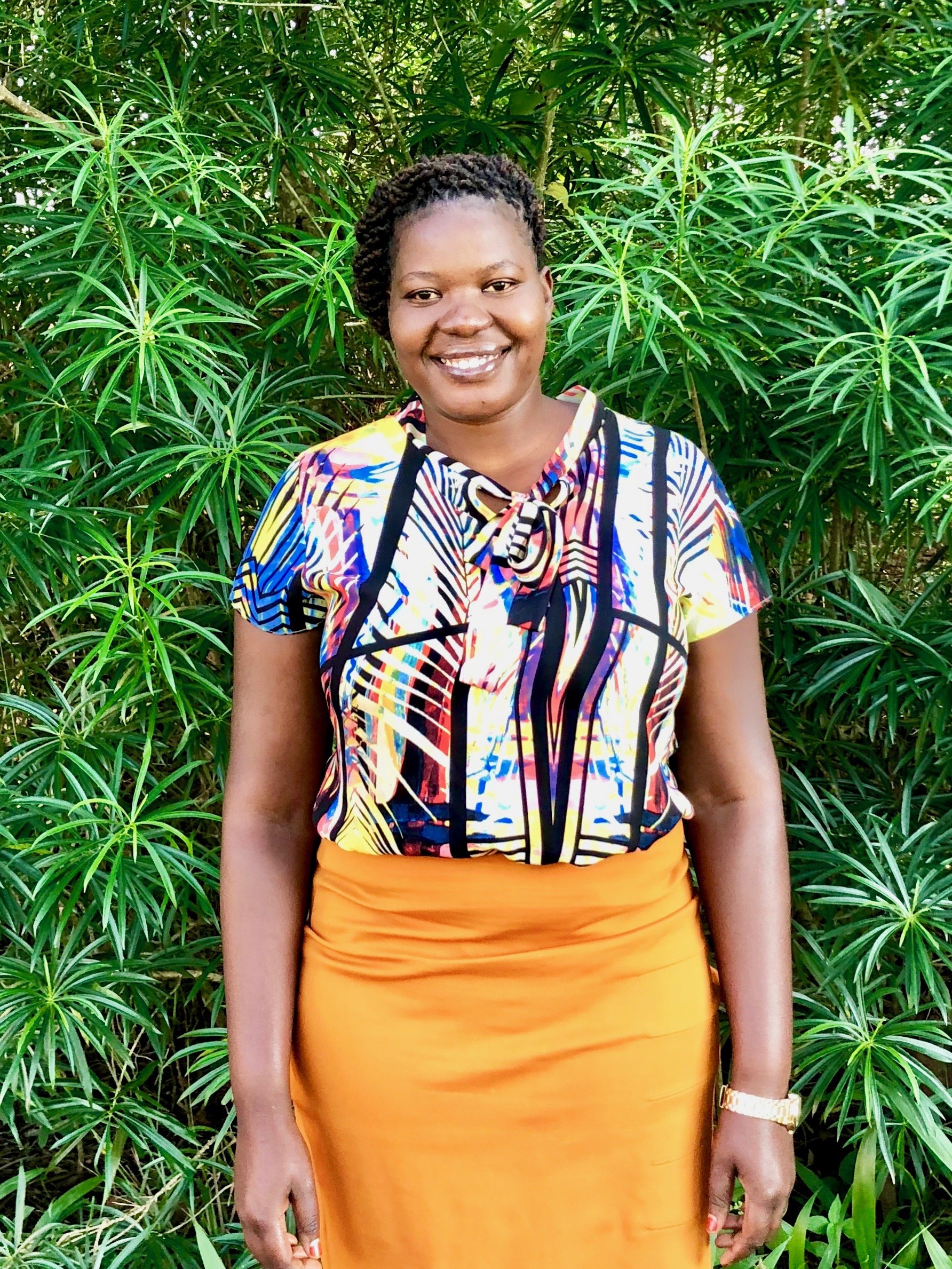 Gloria Adyambo/Program Manager