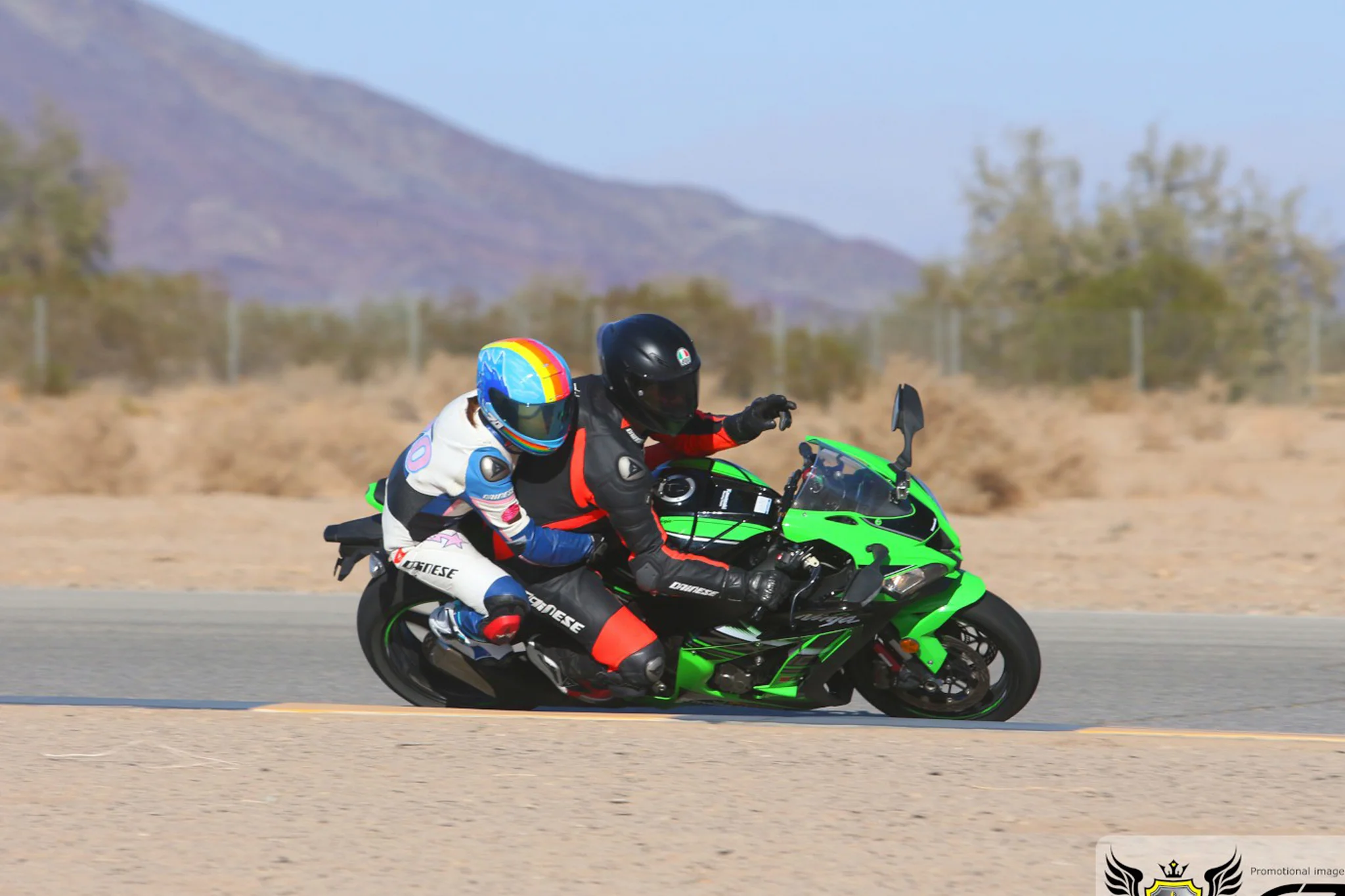 Jason pointing to the corner exit during a 2-up ride. PC: Caliphotography