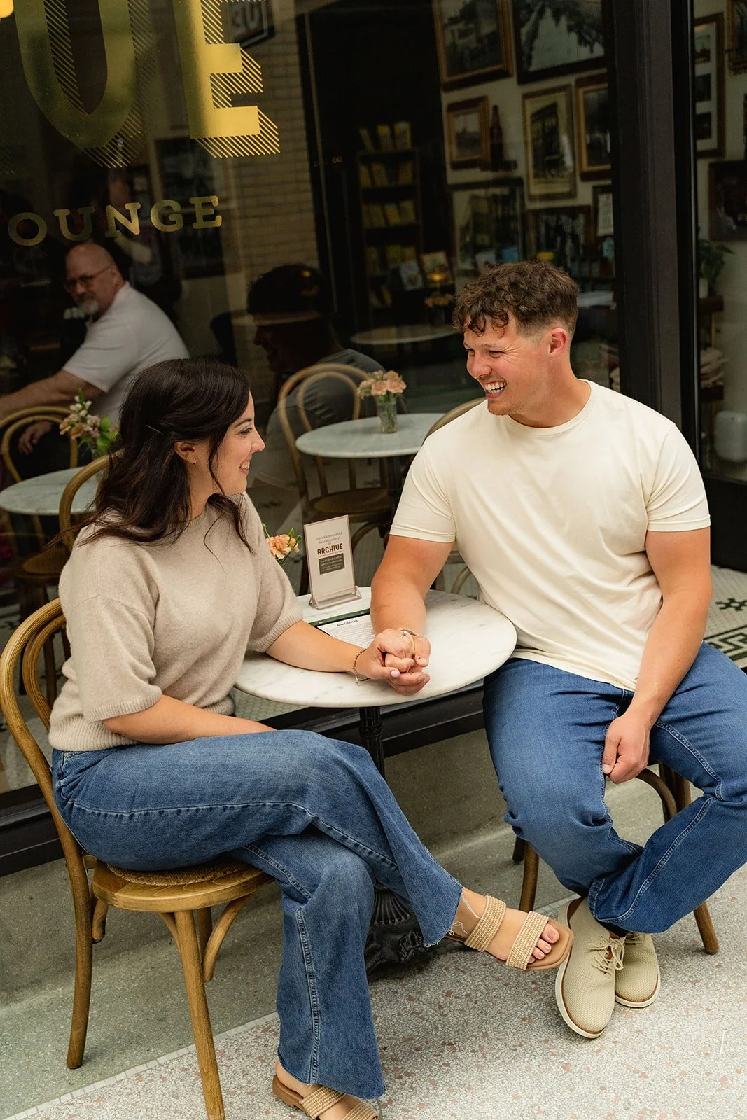 Coffee shop engagement session in the Newark Historic Arcade in Ohio