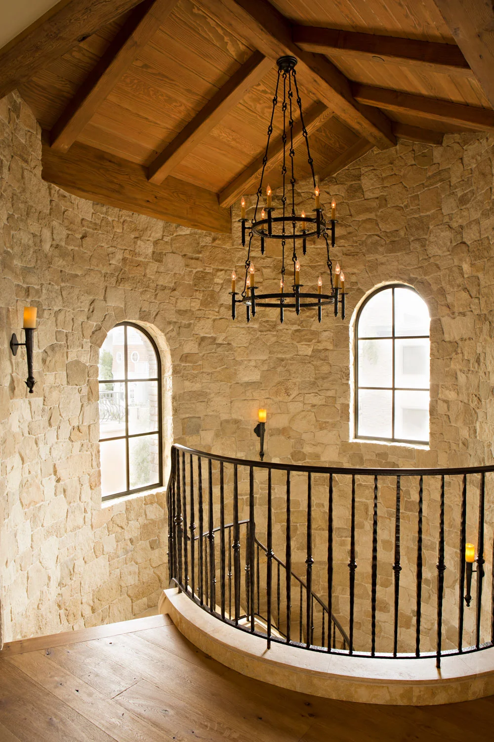 Tuscan-Mediterranean-Spiral-Staircase-Landing-Iron-Railing-corbin-reeves.jpg