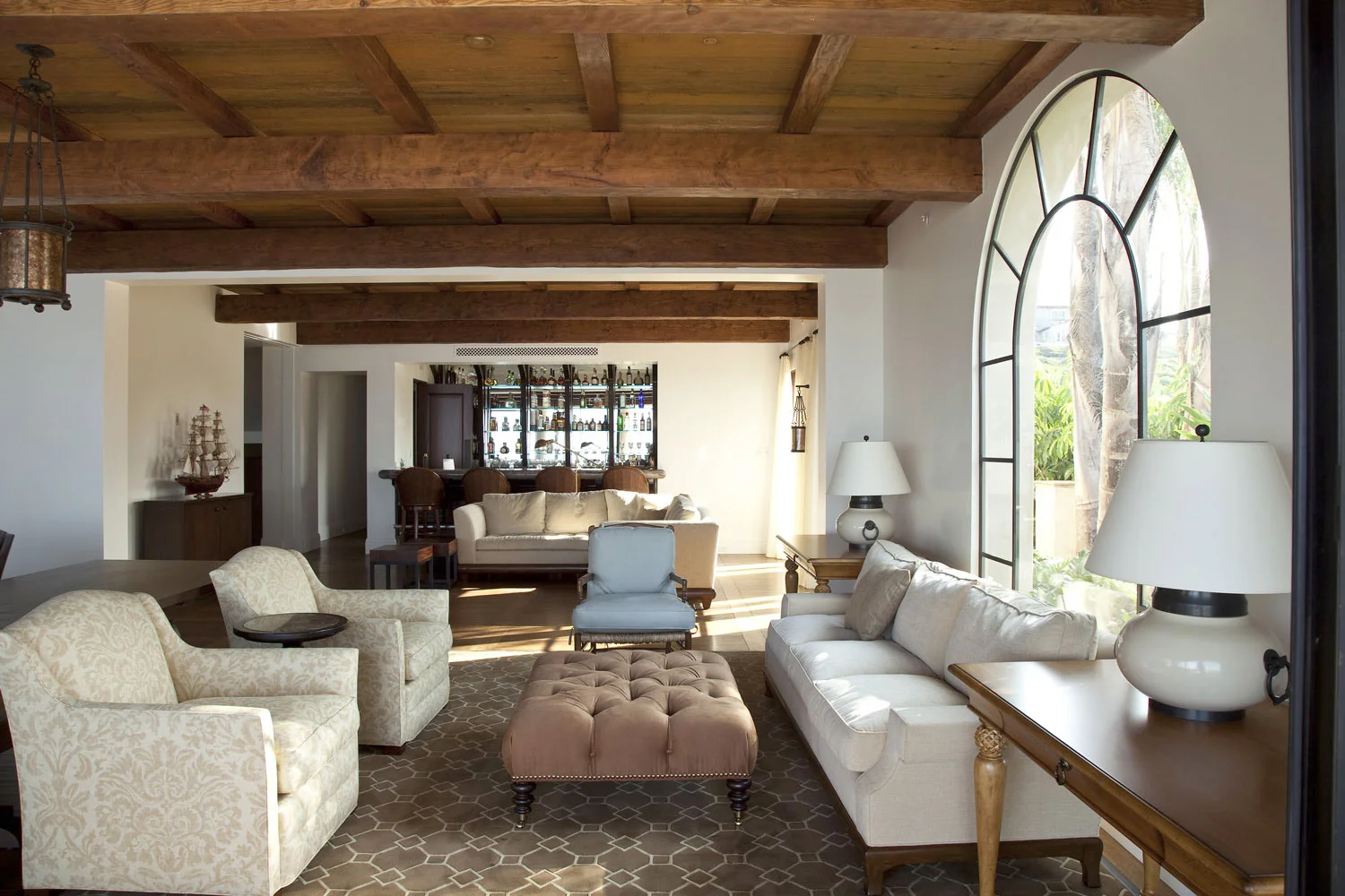 Contemporary-Spanish-Bar-Beamed-Tongue-Groove-Ceiling-Arched-Window-Corbin-Reeves.jpg