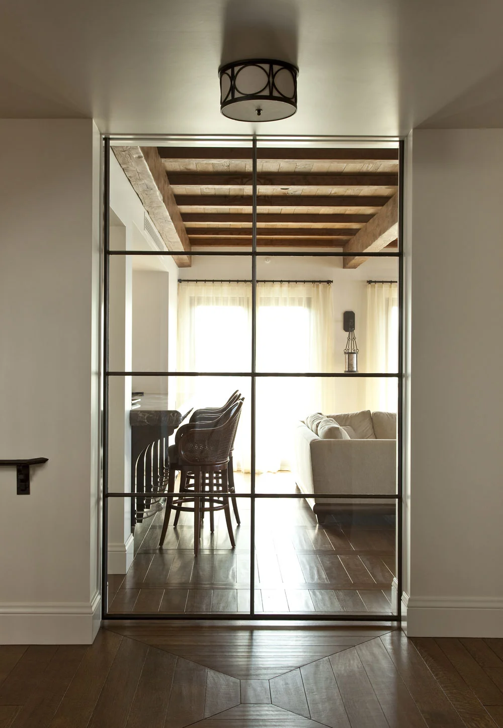 Contemporary-Spanish-Glass-Door-Wood-Floor-Detail-Corbin-Reeves.jpg