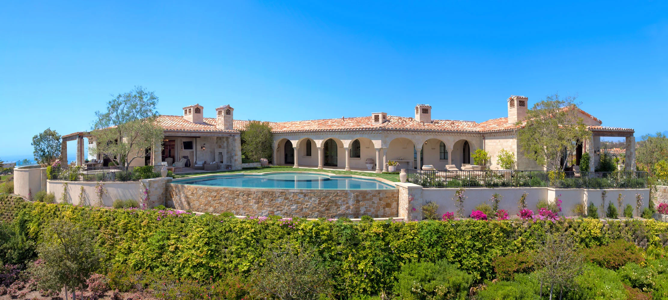 Contemporary-Mediterranean-Rear-Facade-Backyard-Pool-Corbin-Reeves.jpg