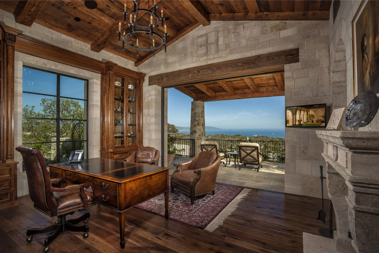 Mediterranean-Office-Vaulted-Beamed-Ceiling-Retractable-Doors-Corbin-Reeves.jpg