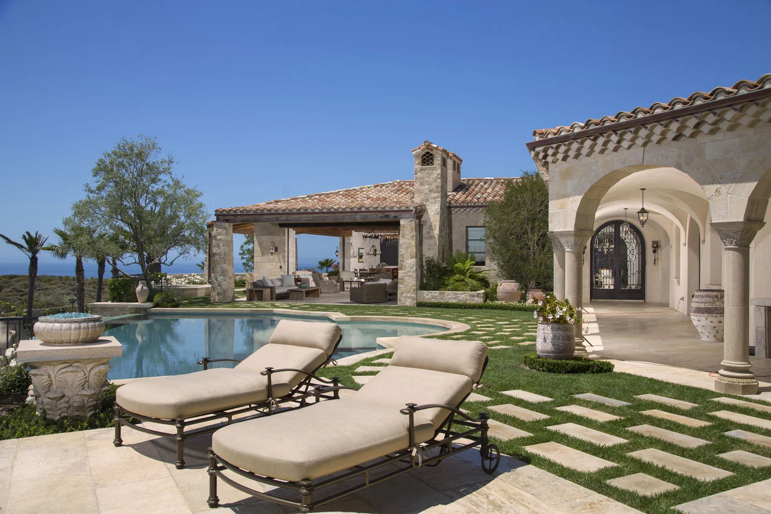 Rear-Yard-Pool-Patio-Rustic-Mediterranean-Corbin-Reeves.jpg