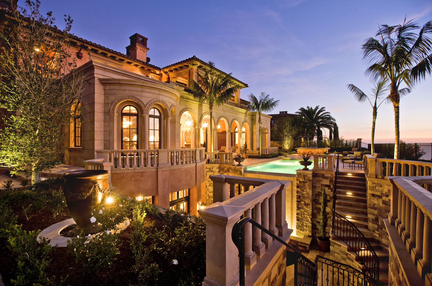 Contemporary-Italianate-Rear-Exterior-Columns-Archways-Pool-Corbin-Reeves.jpg