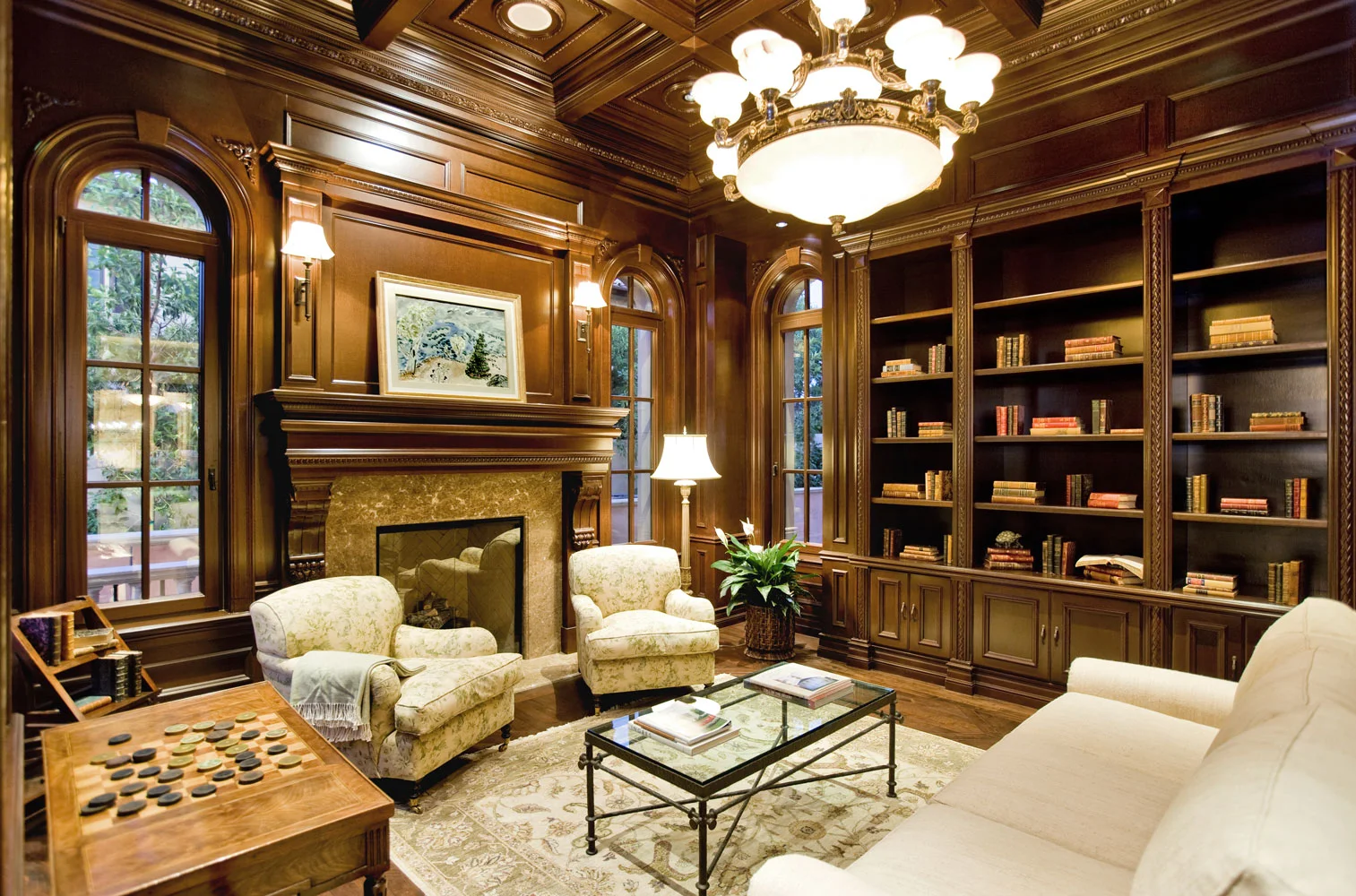 Traditional-Library-Wood-Paneling-Shelves-Fireplace-Coffered-Ceiling-Corbin-Reeves.jpg