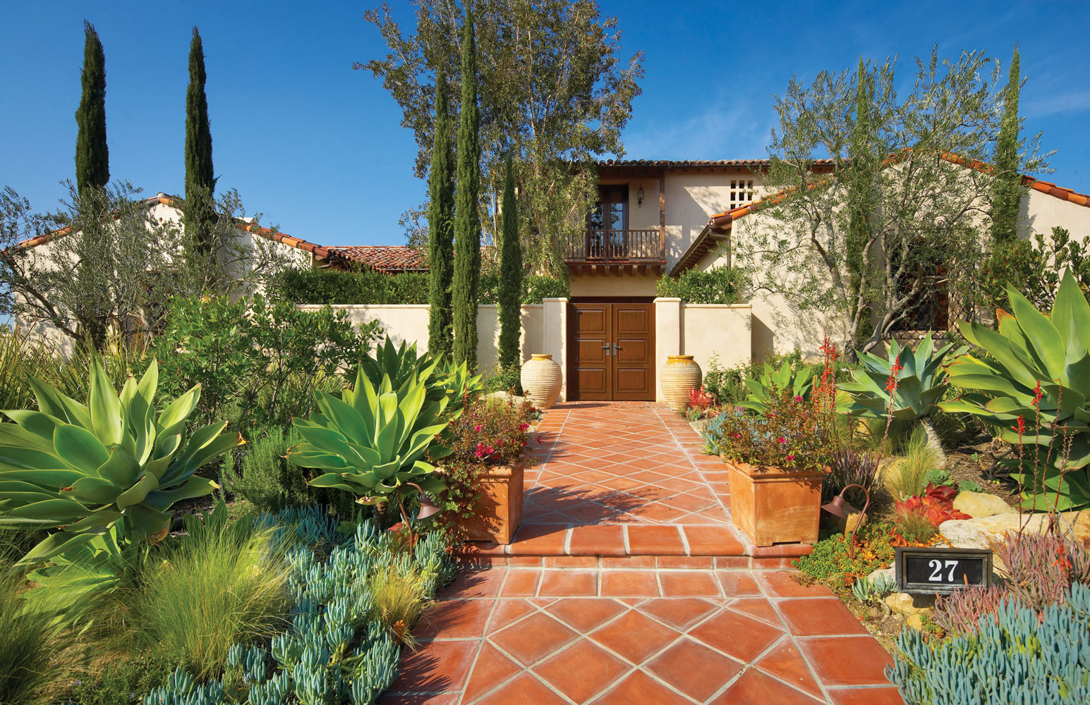 Contemporary-Spanish-Front-Entry-Courtyard-Tile-Path-Corbin-Reeves.jpg