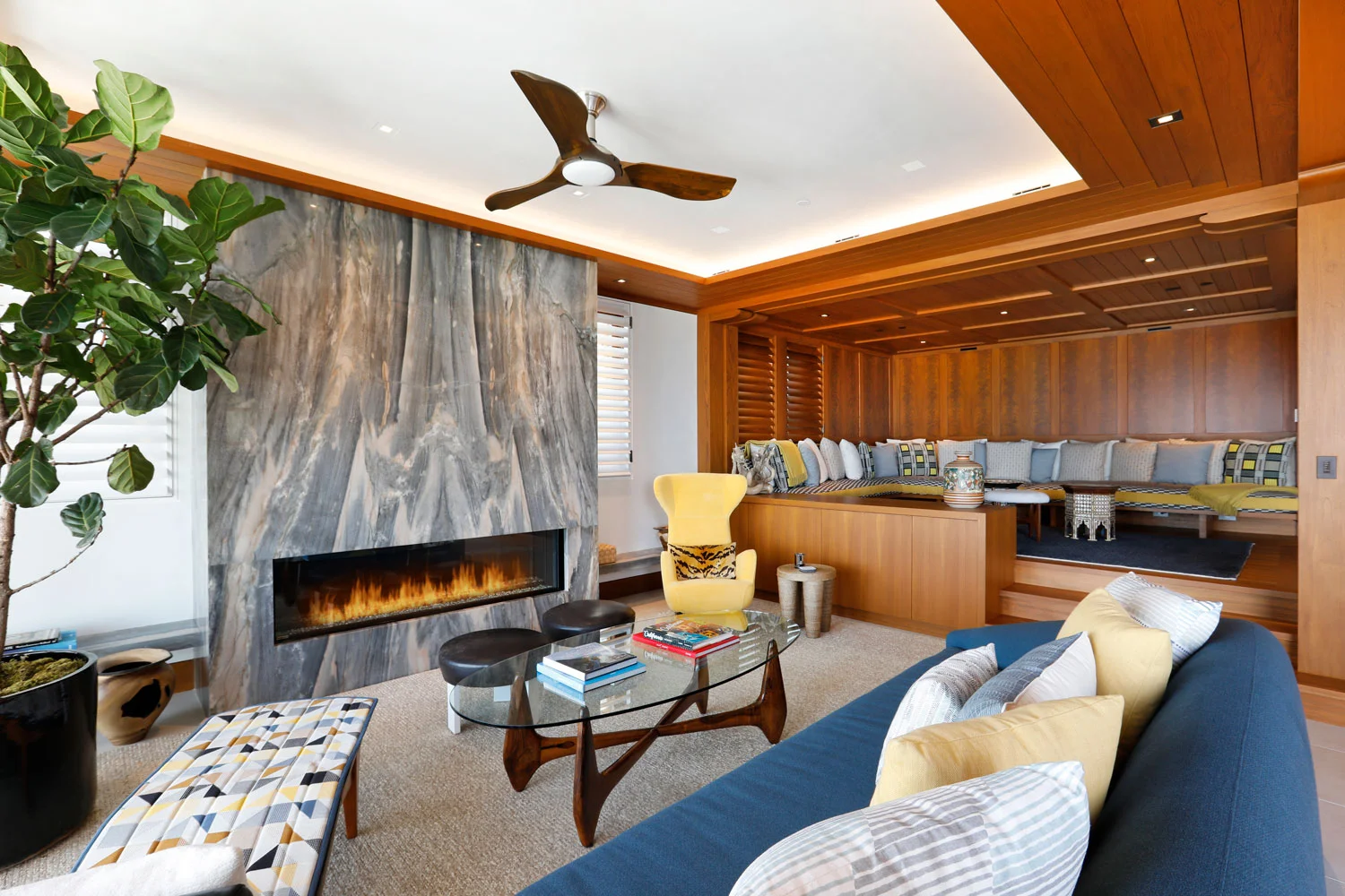 6-Contemporary-Living-Room-Marble-Fireplace-Wood-Paneling-Corbin-Reeves.jpg