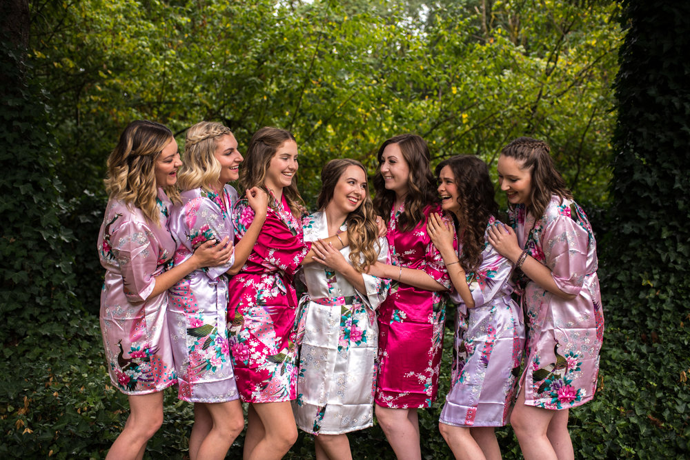 Bridesmaids hugging the bride in Abbotsford BC wedding