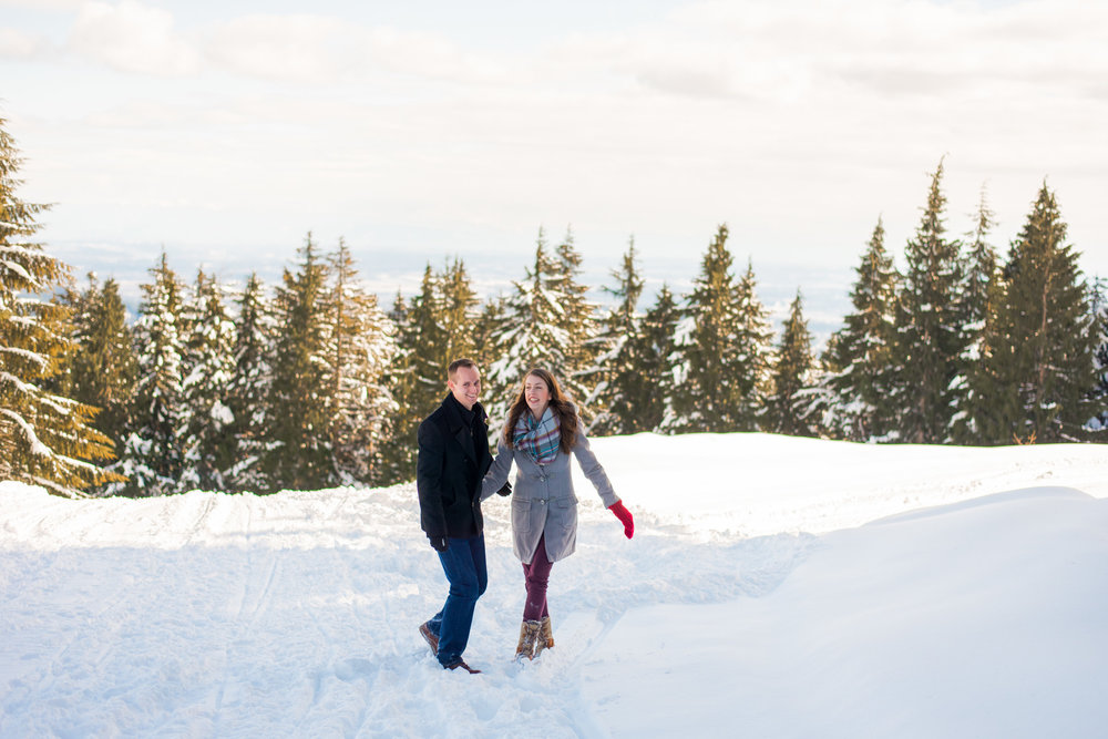 Couple spending time in the snow on top of Mount Seymour