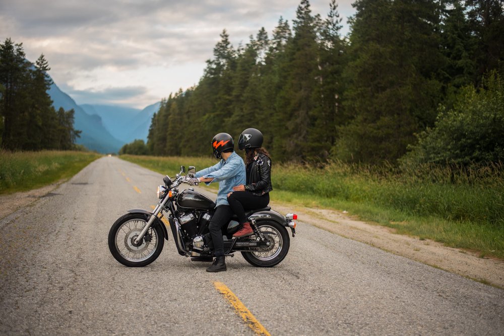 Engaged couple on motorbike in pitt meadows
