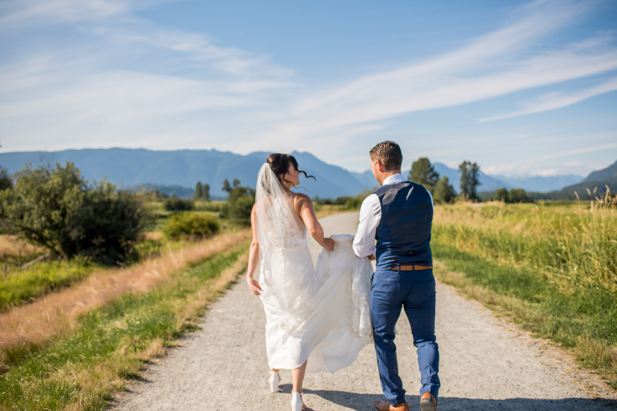 Bride and Groom walking in Jerry Sulina Park, Maple Ridge, BC