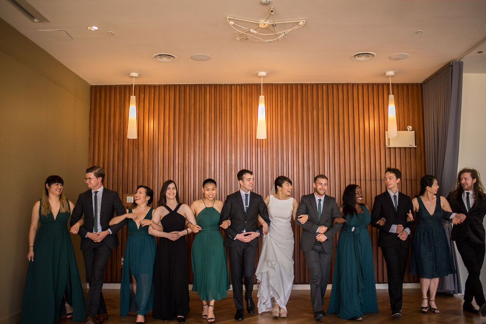 Wedding party hanging out together in Sage Restaurant at UBC