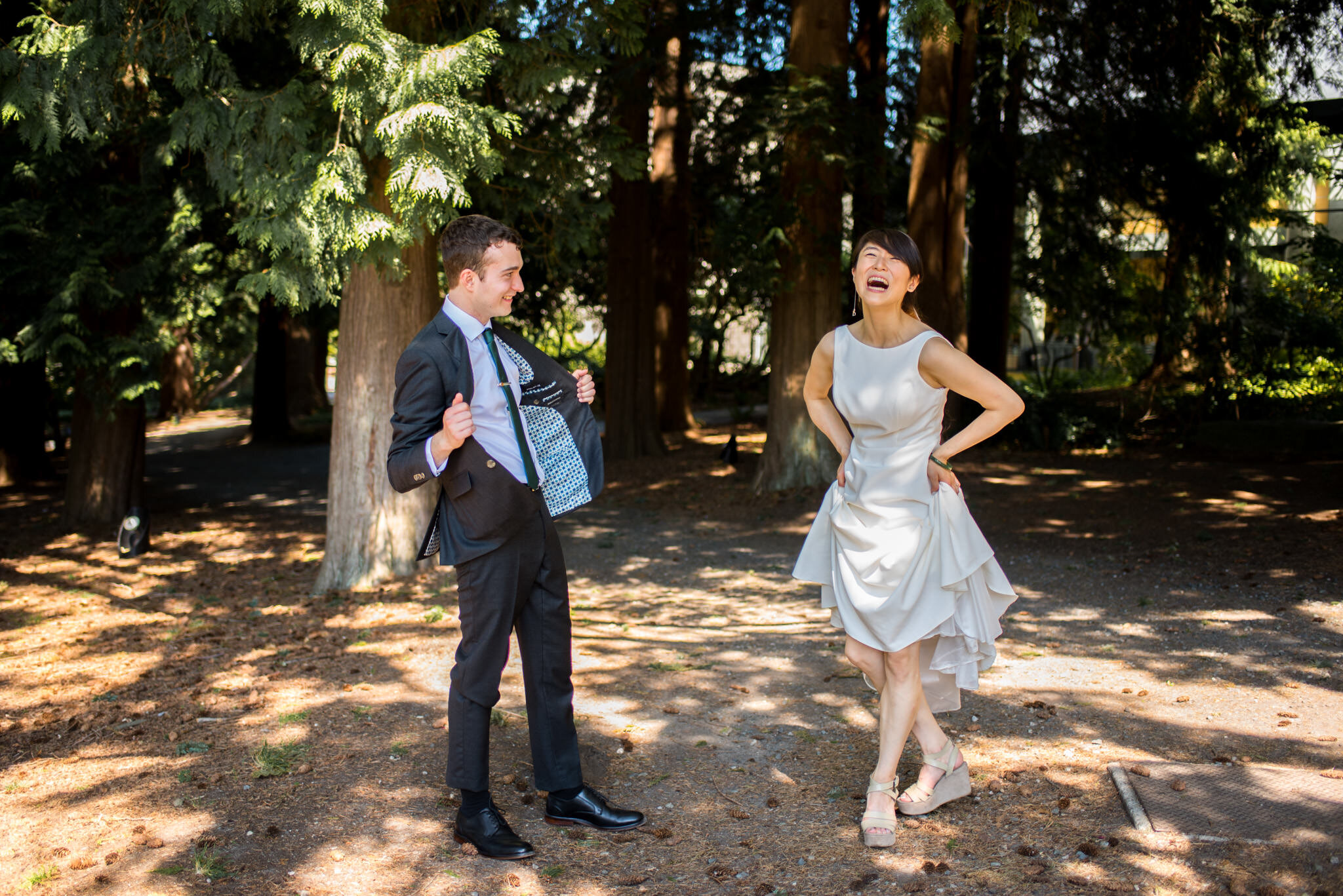 Bride and Groom being silly in forest at UBC Rose Garden, Vancouver B.C.