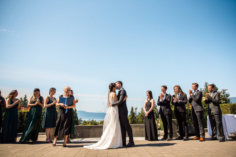 Bride and Groom share first kiss at Vancouver B.C UBC Rose Garden