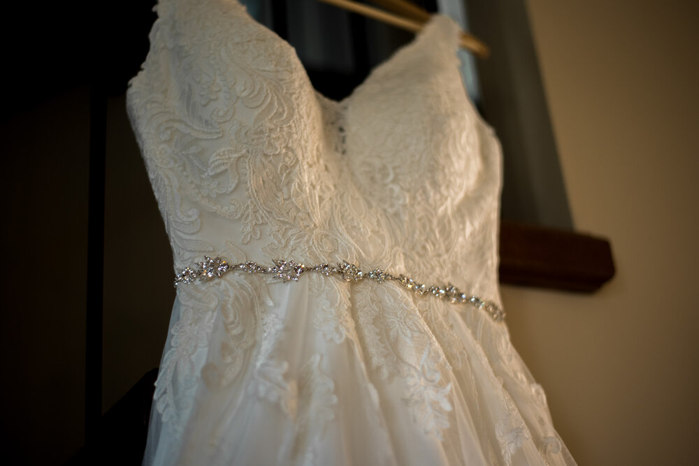 Wedding Dress from Lisa's Bridal hanging on a staircase in New Westminster, B.C.