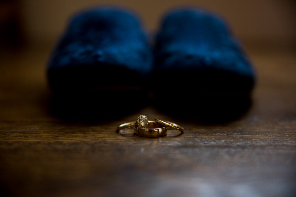 Engagement ring posed with wedding day shoes on a floor of a home in New Westminster, B.C.