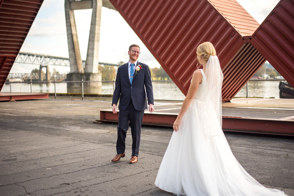 Groom turns around to see his bride for the first time at Pier Park in New Westminster, B.C.