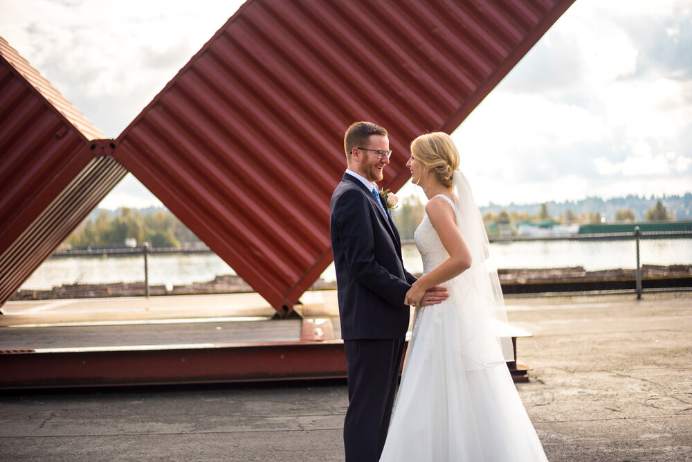 Bride and groom share a moment after their first look in New Westminster, B.C.