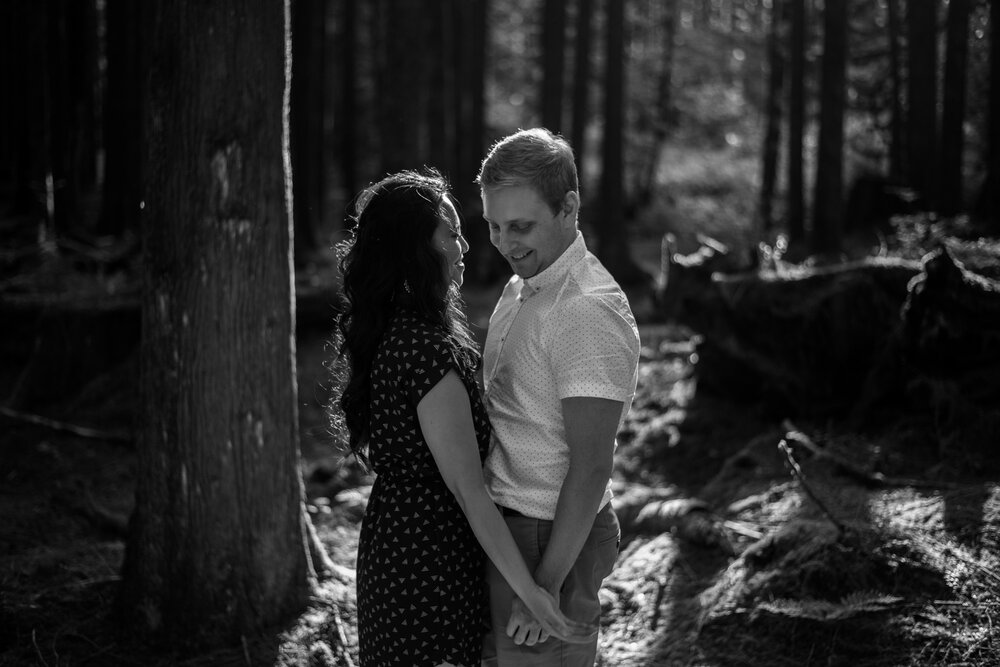 A black and white image of a couple standing at Golden Ears Provincial Park in Maple Ridge, BC.