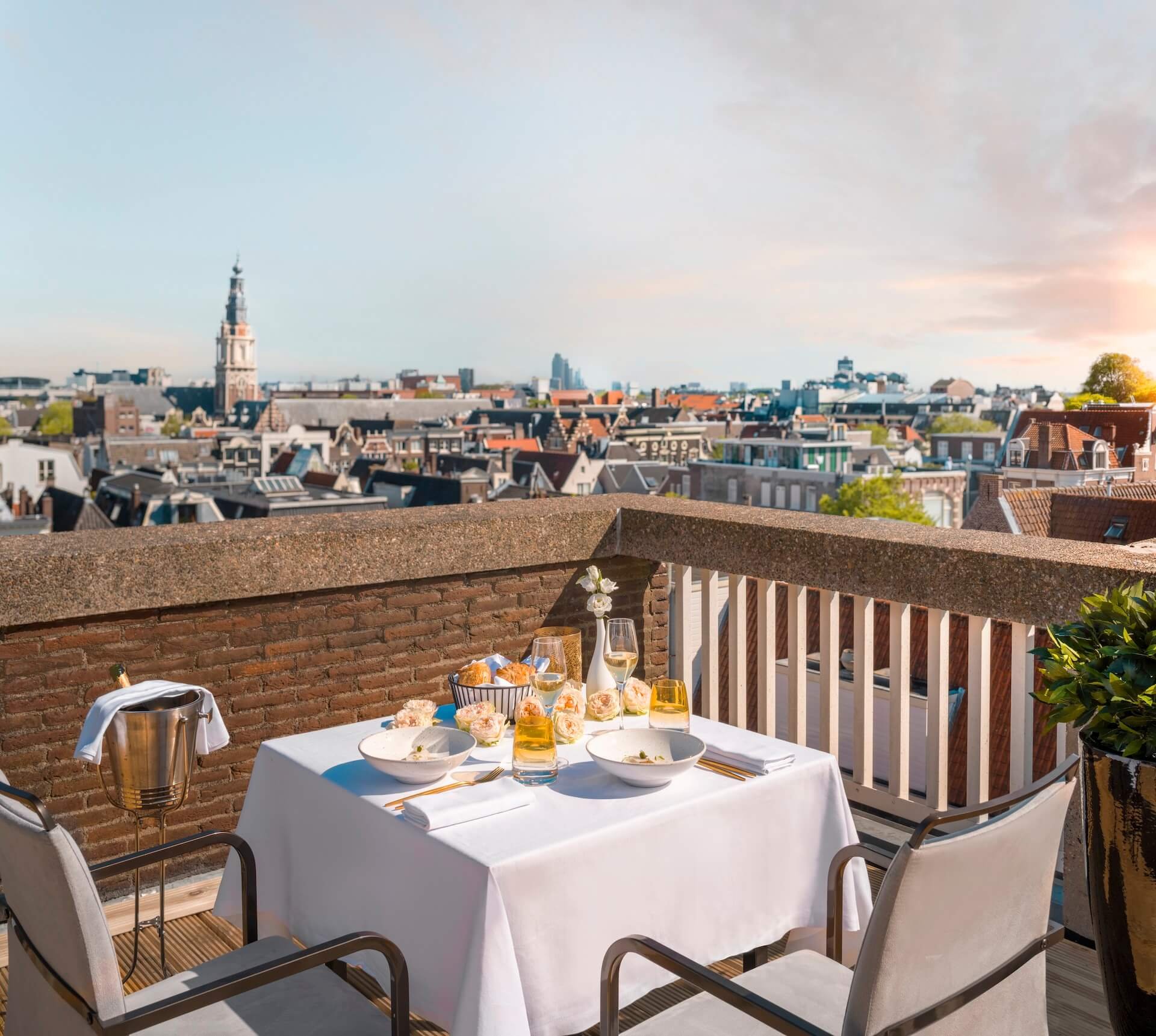 Anantara_Grand_Hotel_Krasnapolsky_Amsterdam_exterior_experience_view_rooftop_romantic_dinner.jpeg