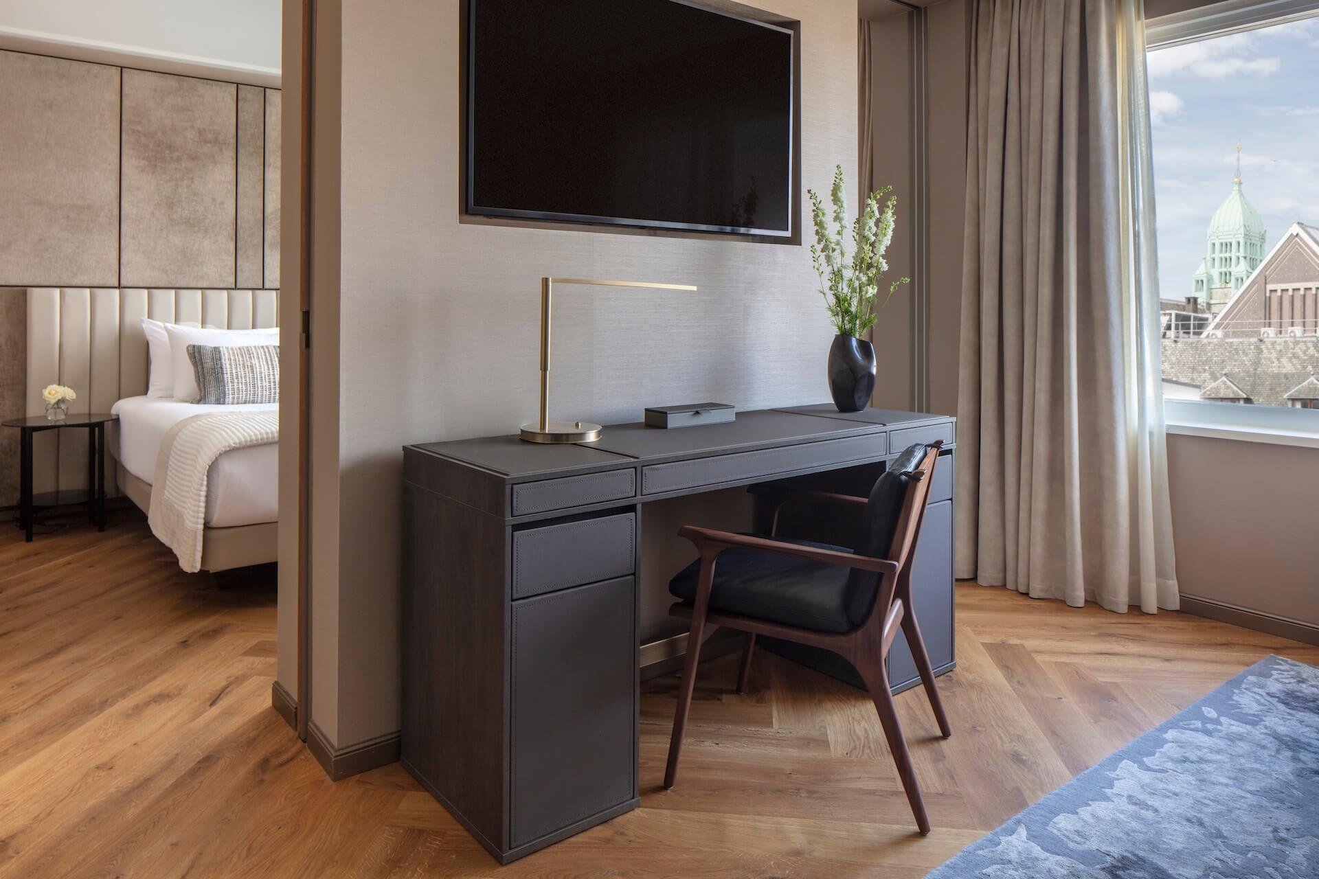 Anantara_Grand_Hotel_Krasnapolsky_Amsterdam_Room_Grand_Deluxe_Living_Area_Seeing_Through_The_Bedroom.jpeg
