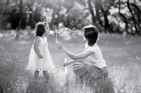 girl-blowing-bubbles.png