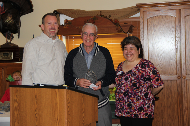 Photo courtesy of Mowers Photography Anthony Abell, center, of Geneseo, a long-time volunteer at Geneseo’s Good Samaritan Village, was presented with the 2013 GIFT Community Caring Award. With Abell is Mike Ricketts, left, president of the GIFT Foundation, and Annette Koehler, activity director/volunteer coordinator for Good Samaritan.
