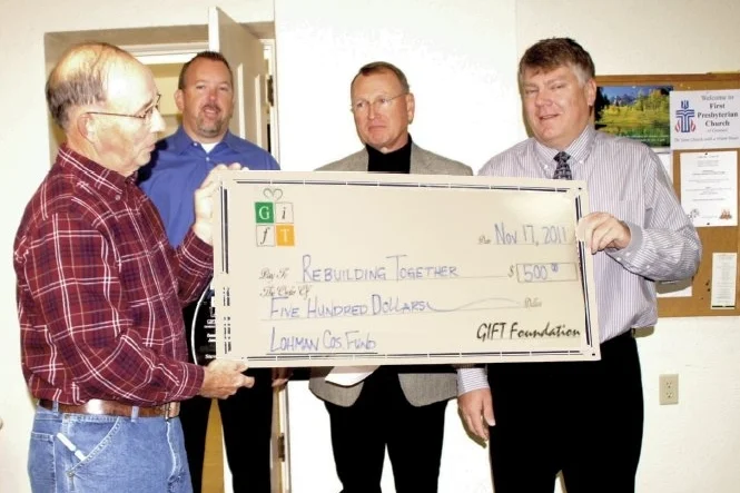 Steve Durian, Vice President of Rebuilding Together Geneseo/Cambridge was surprised with the GIFT Community Caring Award during the November 17th Rebuilding Together board meeting. In addition to the award, a $500 donation was made in Steve’s name to Rebuilding Together by Lohman Companies Insurance Foundation fund with GIFT. Pictured from left are Steve Durian, vice president of Rebuilding Together, Mike Ricketts, incoming president of GIFT, Bob Kuhns, outgoing president of GIFT, and Brett Lohman of Lohman Companies Insurance and GIFT past president and board member.