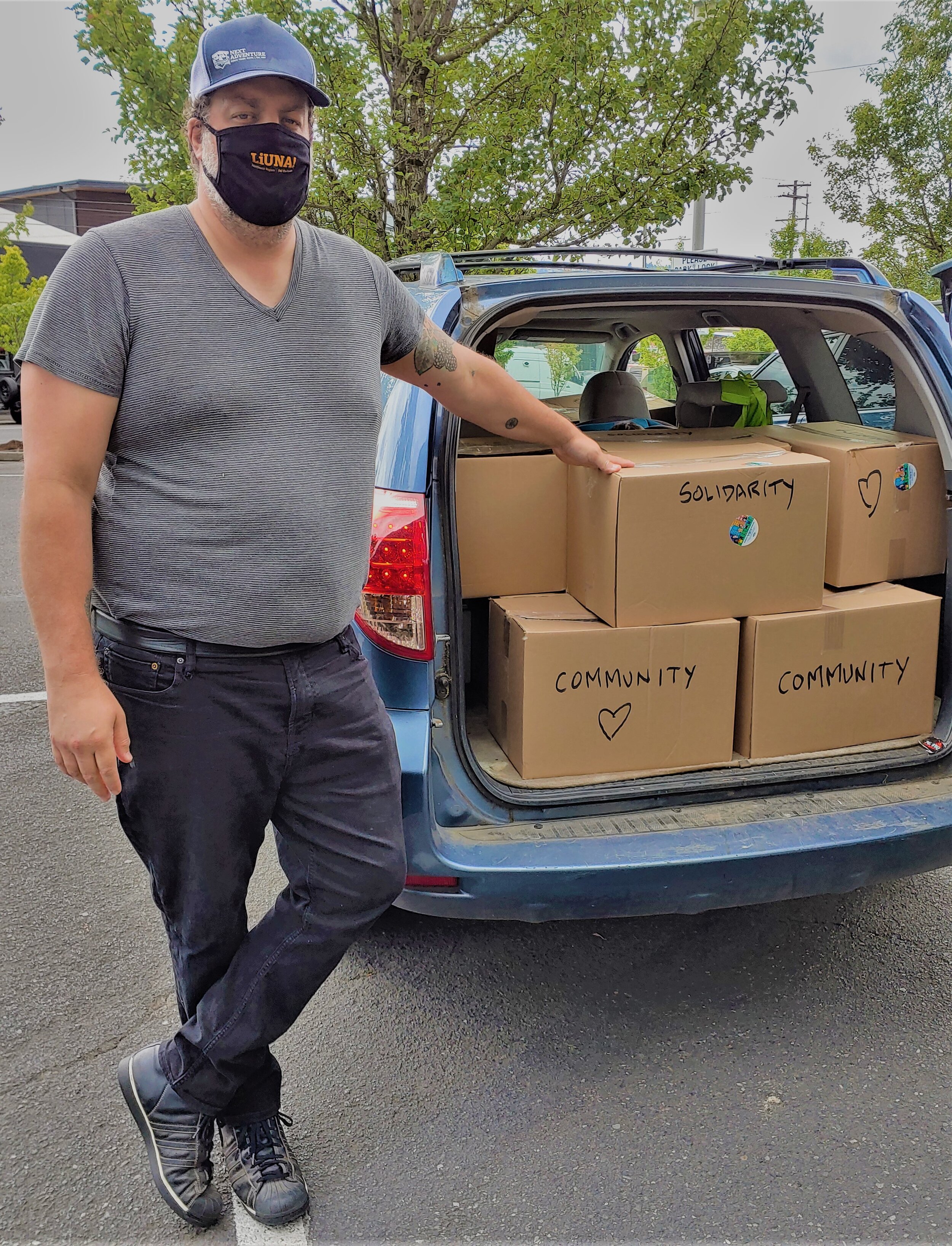 Ryan delivers food boxes July 2020.jpg