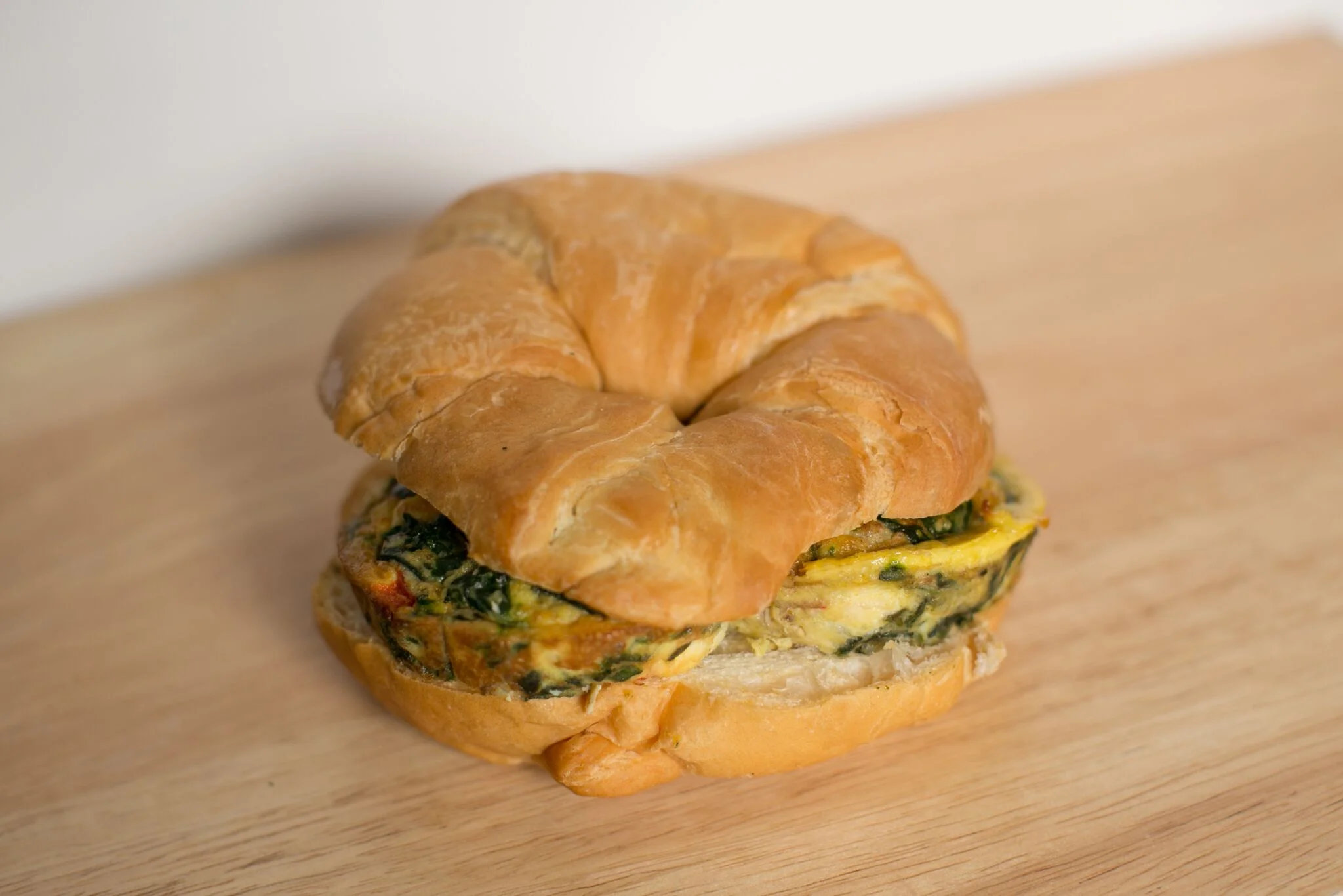 Turkey Sausage, Spinach and Feta Frittata on Croissant