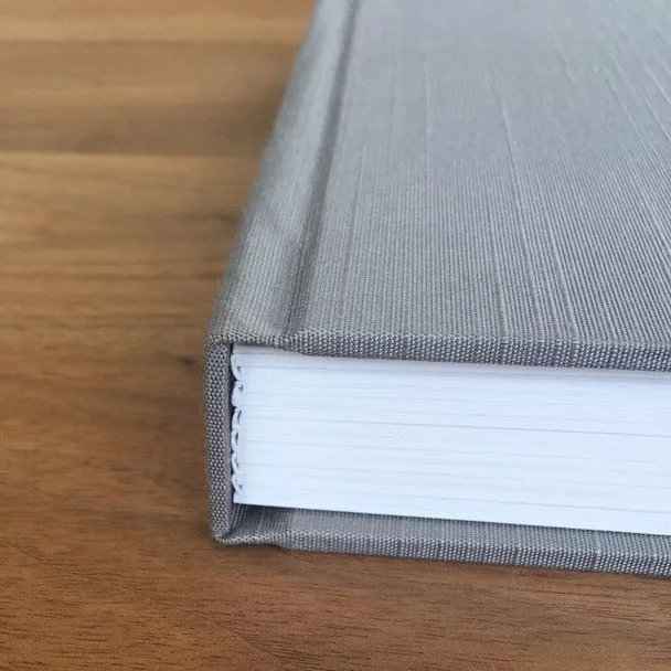 - closed matted album with Silver Moon Japanese silk cover -