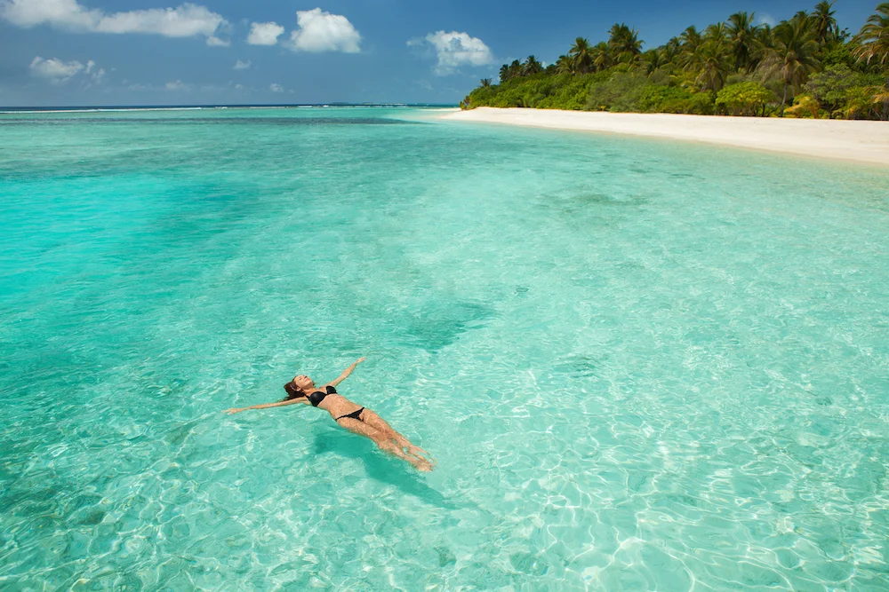 bigstock-Woman-swim-and-relax-in-the-se-170335655.jpg