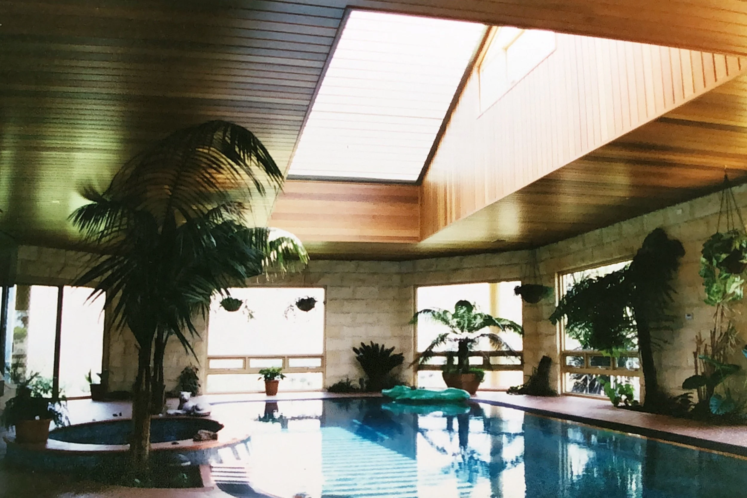 indoor raking over pool.jpg