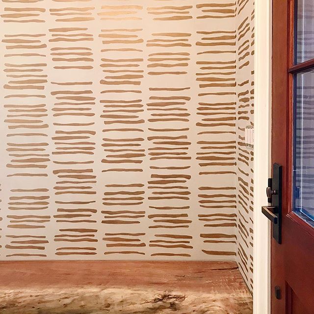 This is particularly awesome! Our custom stencil -- inspired by the wallpaper of Porter Teleo -- allowed this client to have a durable finish in their entryway, a small feat that would have been tough had it been delicate wallpaper installed in such 