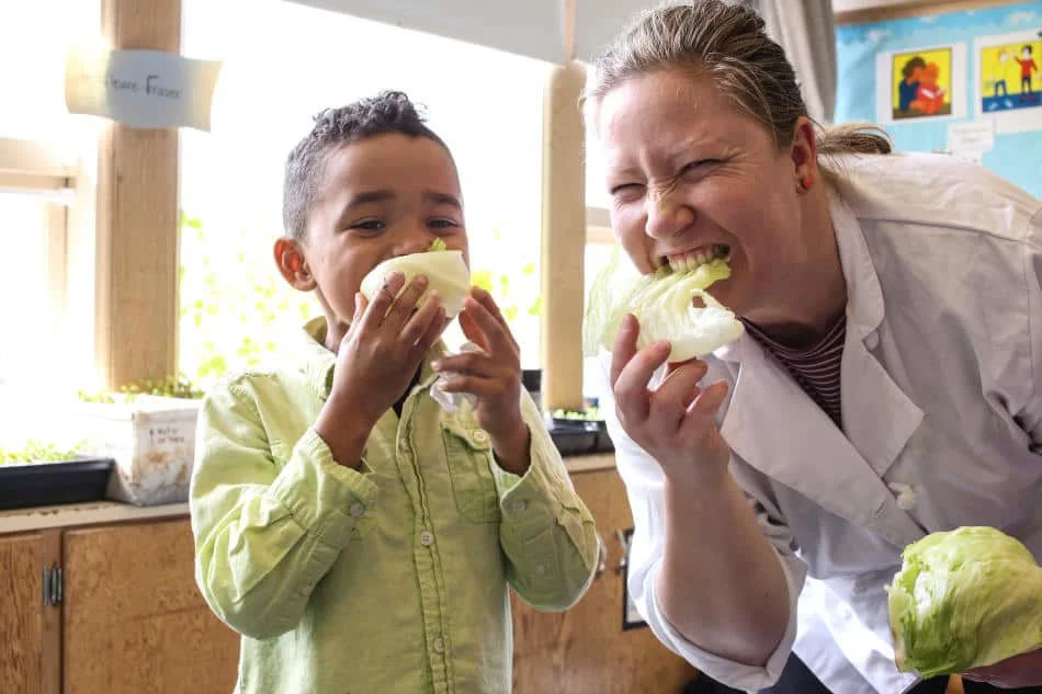 Growing CHefs tasting lettuce