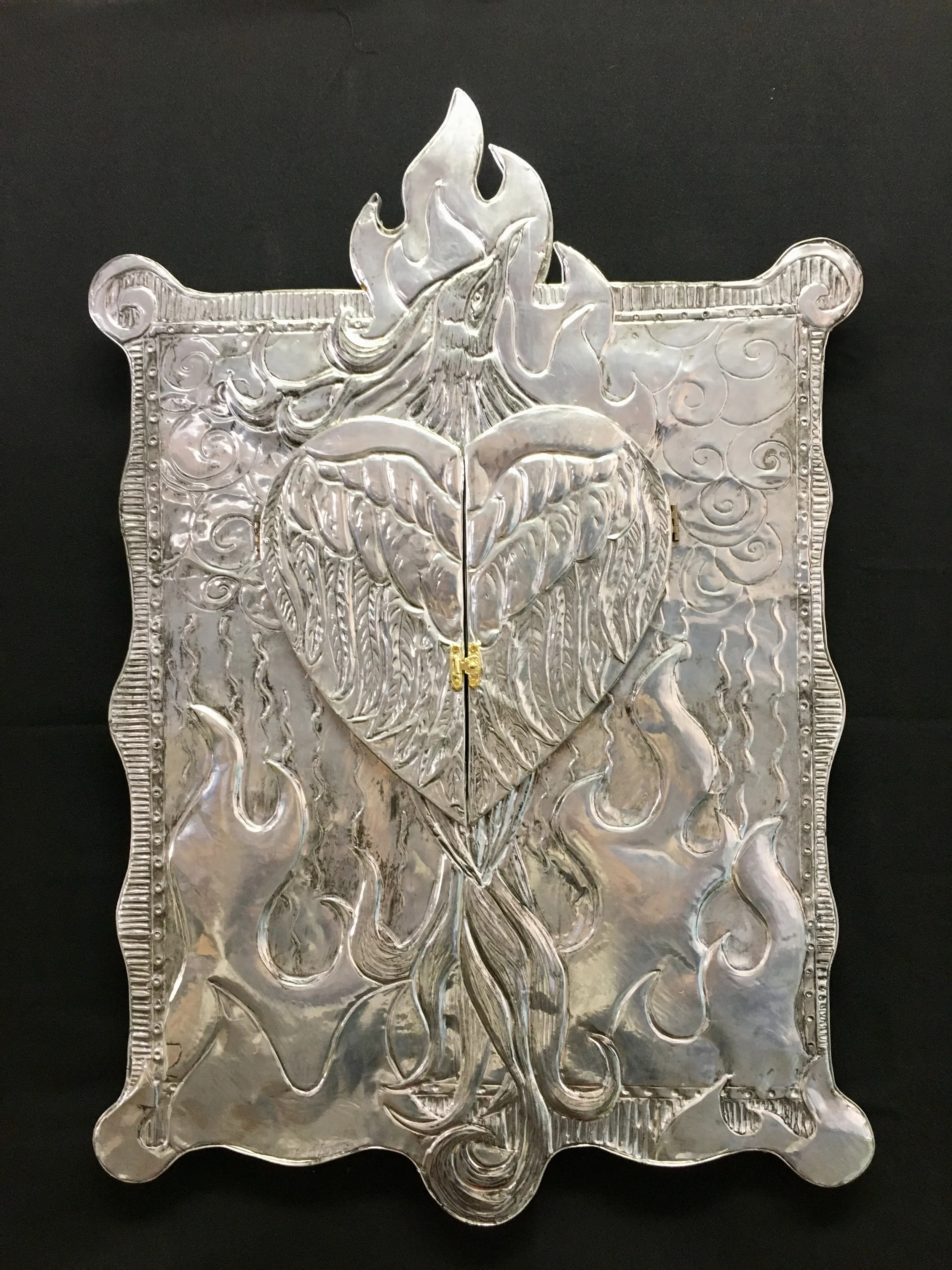   Virgin Phoenix From Her Ashes Rises  2019, charcoal and watercolor on panel with aluminum, 18” x 24” closed version 