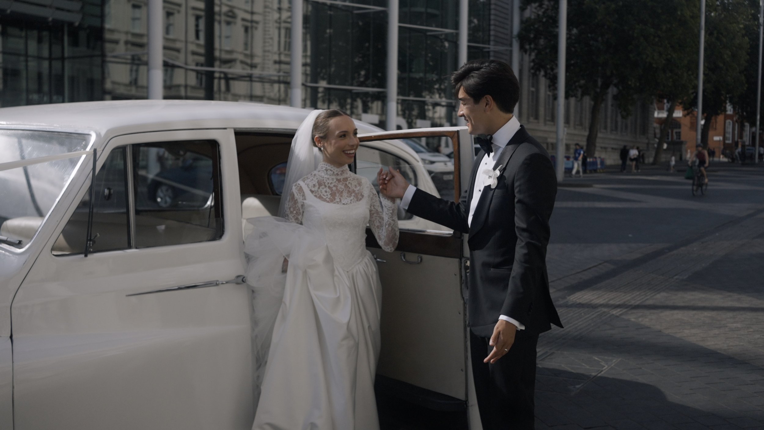 bride and groom arrive at Ognisko restaurant