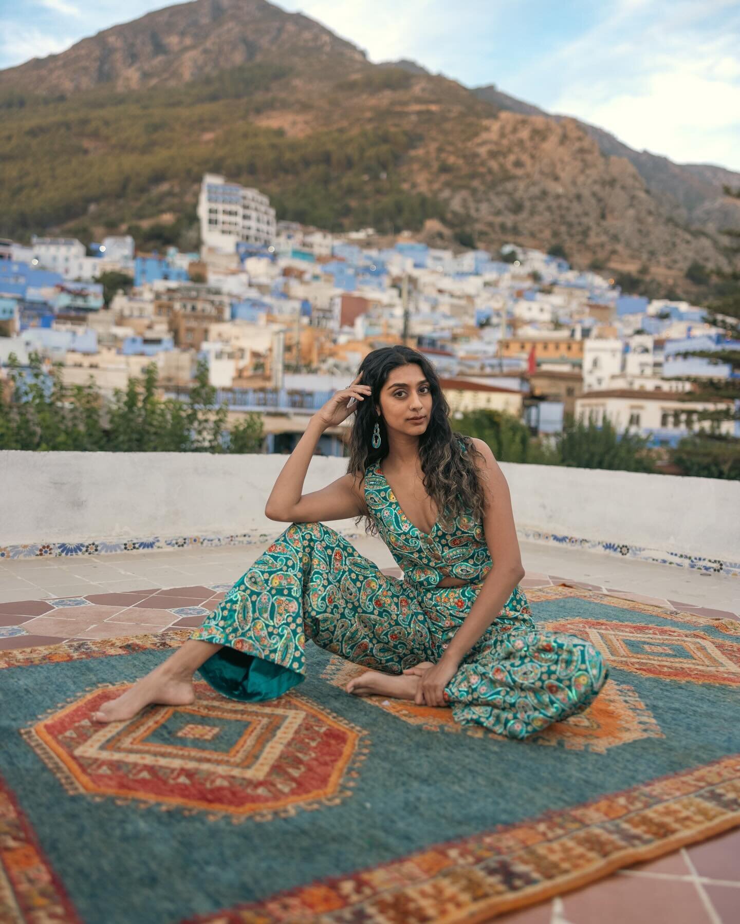 AANYA | Not your average Monday blues with the rustic, one of a kind charm of Chefchaouen, Morocco and this adorable two piece set which we made with a paisley pattern and zari work fabric, balancing the dramatic wide leg pant with a fitted double cu