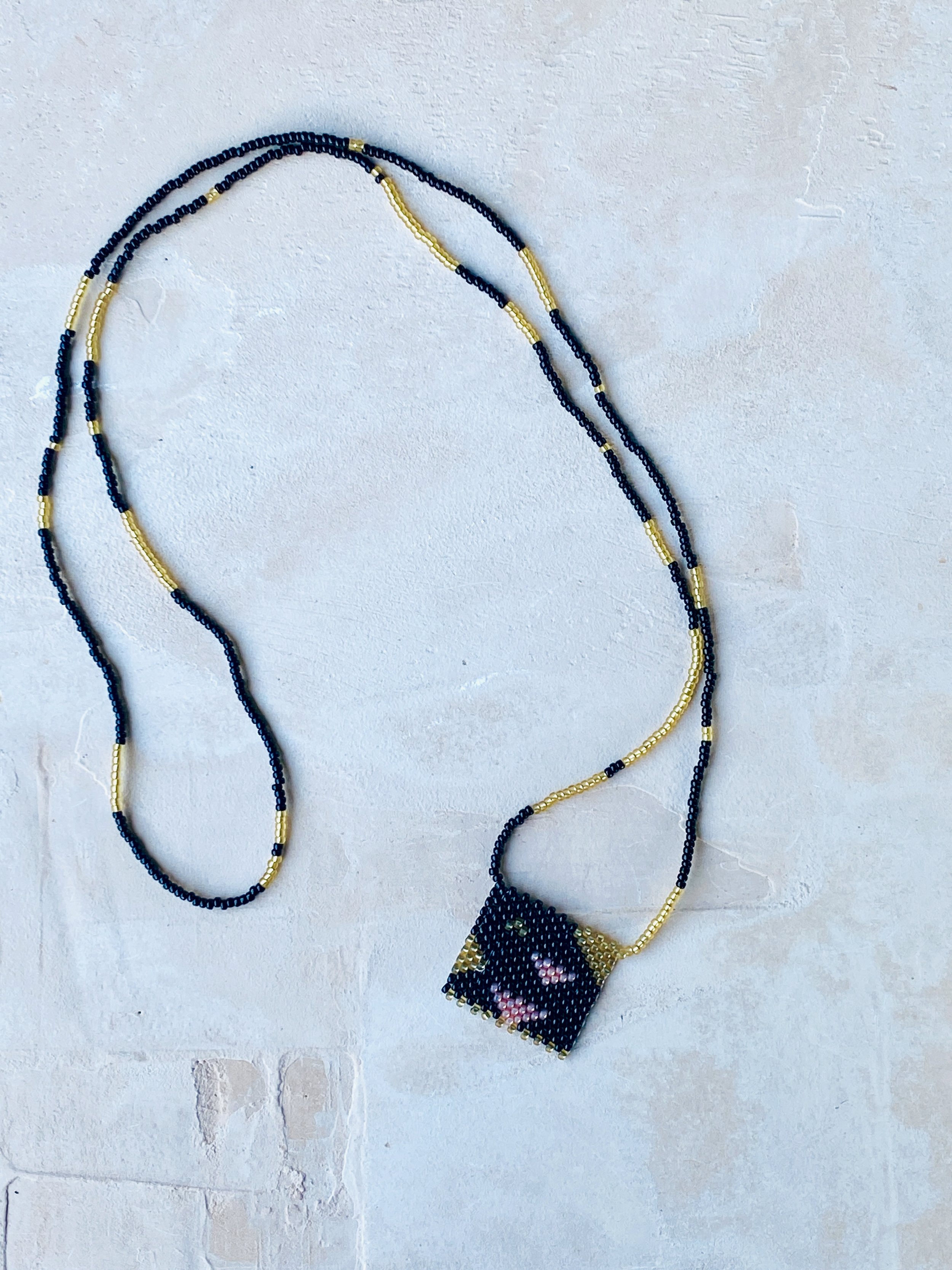 black-gold-long-boho-necklace-handmade.jpeg