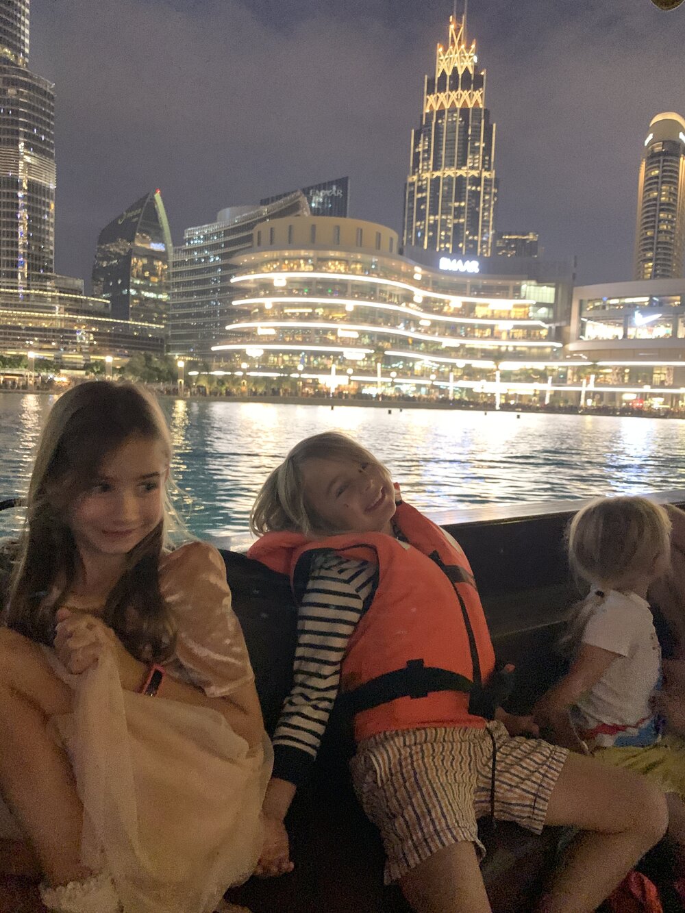 Seeing the Dubai Fountain from an abra ride on the lake