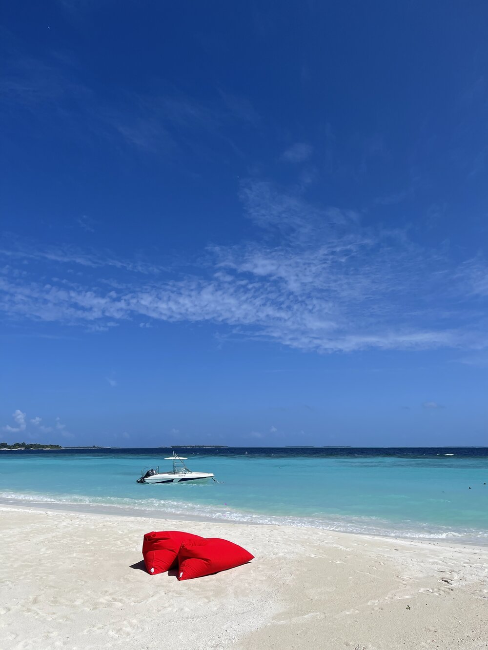 The beach at Emperor Beach Club on Amilla Fushi