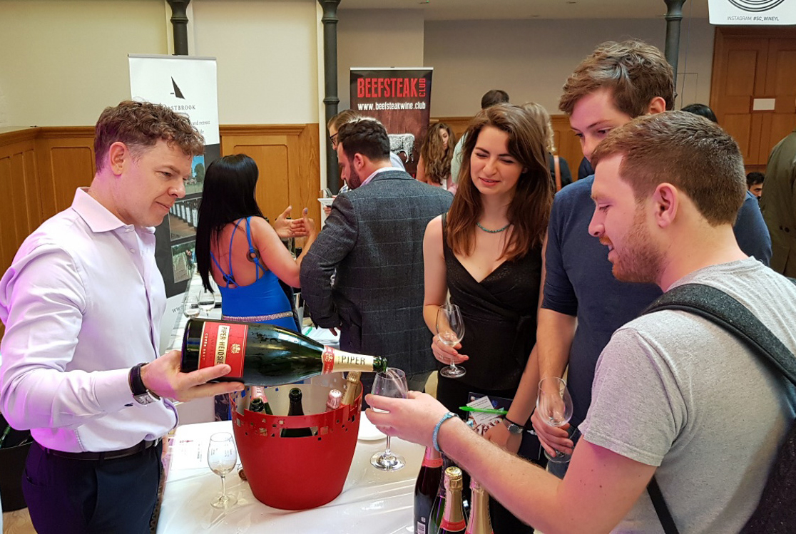  Simon Stockton, of Piper-Heidsieck, pouring on the starts of the show: the newly released 2012 vintage.  