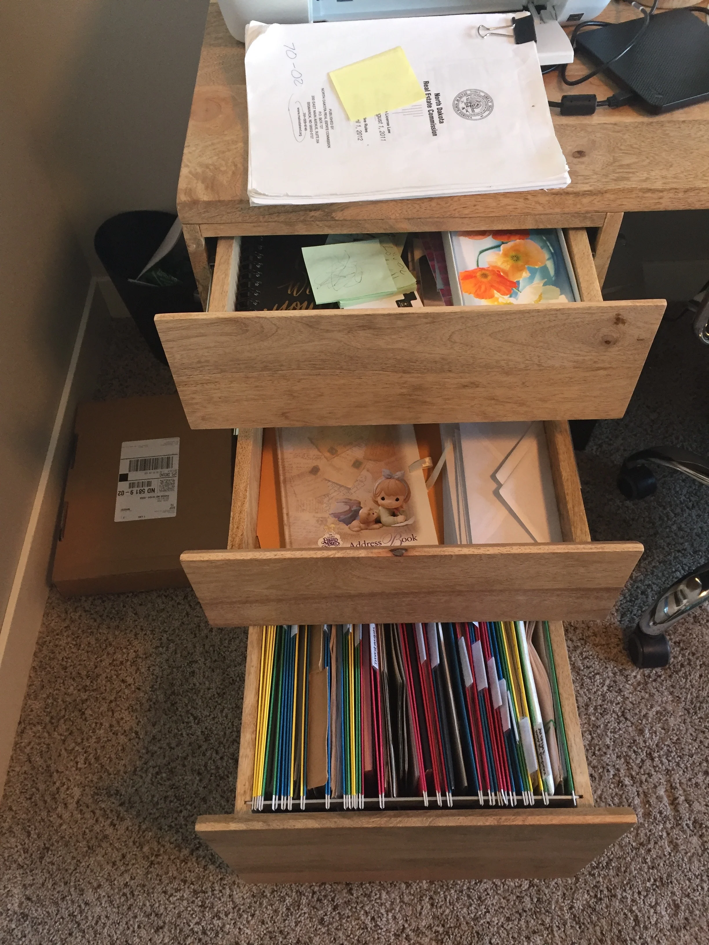 BEFORE - This client felt overwhelmed by drawers bursting at the seams with papers.